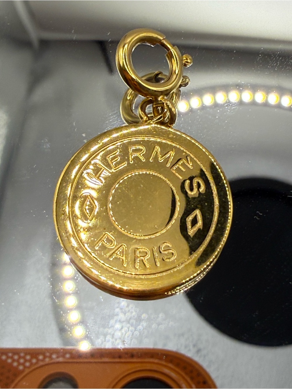 Hermès Sellier Round Medallion Charm Pendant Gold Tone